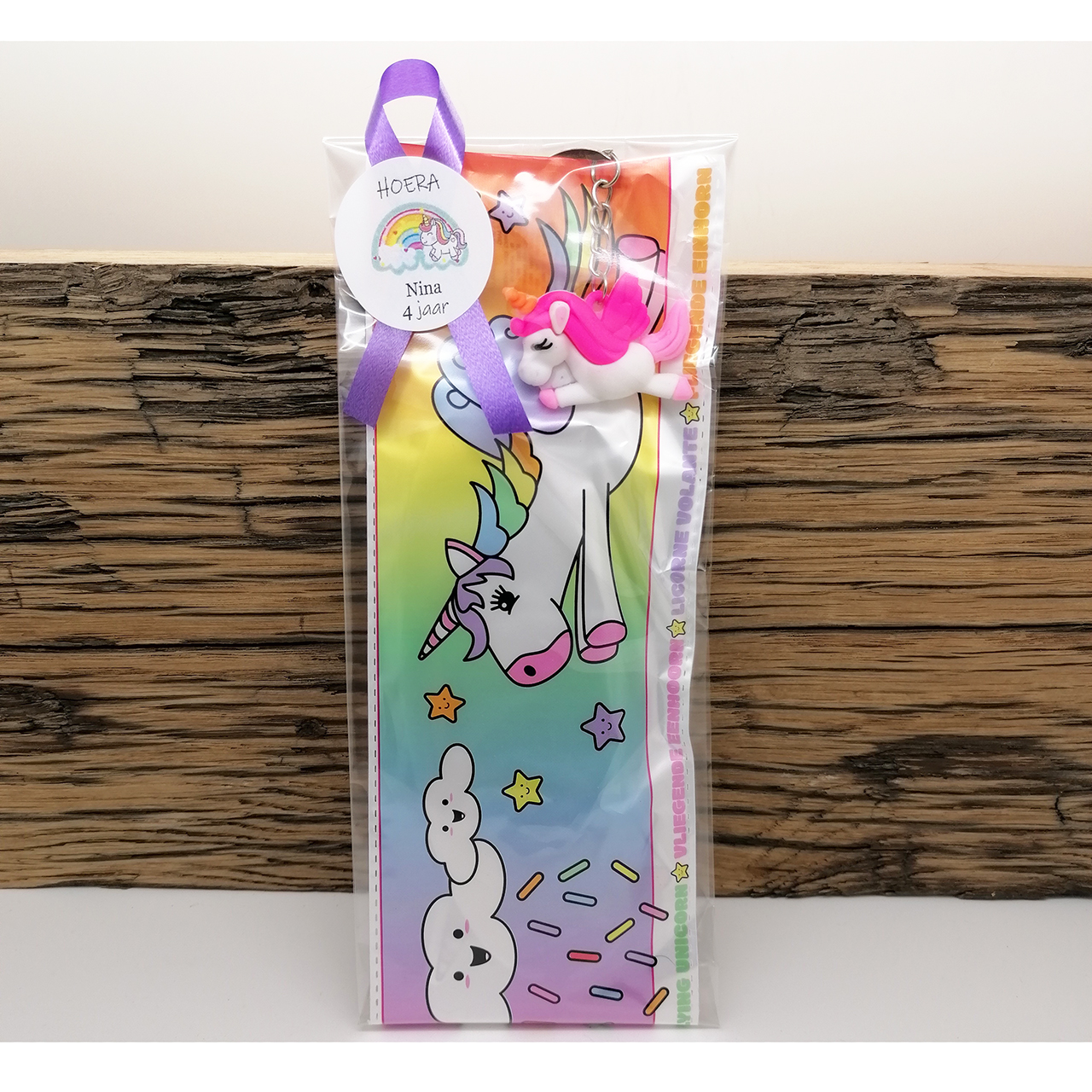 Traktatie eenhoorn sleutelhanger vliegtuigje