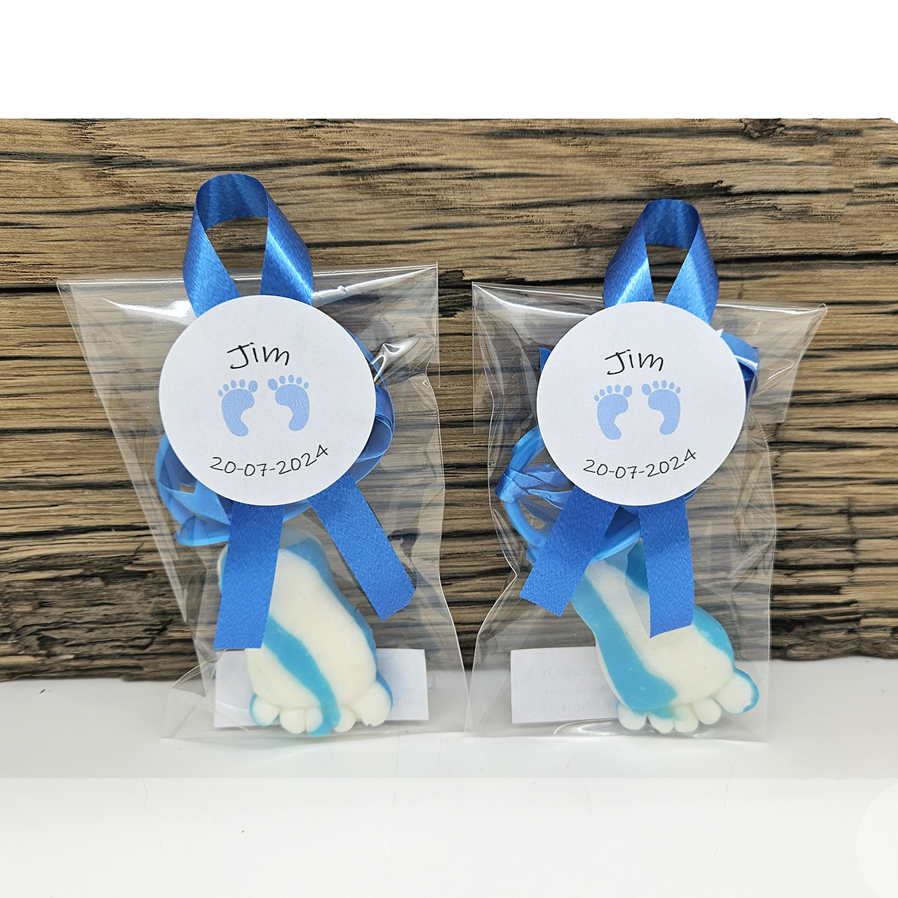 Geboorte jongen traktatie bedankje lolly blauw wit voetje Geboorte bedankjes blauw baby voetje lolly kant en klaar